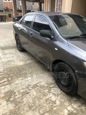 Toyota Corolla Base 4dr Sedan (1.8L 4cyl 5M) 2010 Gray