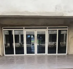 Premium Aluminium Swing Door With Fixed Glass Lights – Modern Design