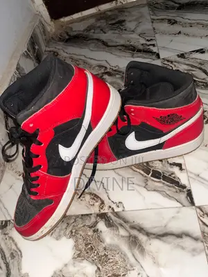 Air Jordan /Nike Sneaker Red, Black and White