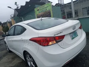 Hyundai Elantra SE Coupe FWD (1.8L 4cyl 6A) 2013 Off white