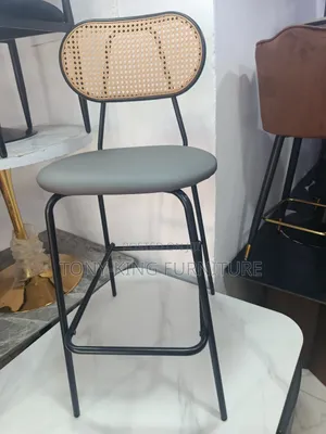 Imported Back Bar Stool Features a Grey Padded Faux-Leather Seat