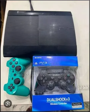 PS3 Super Slim With Two Pads and 18 Games