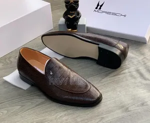 Moreschi Noir Perforated Luxe Loafer.