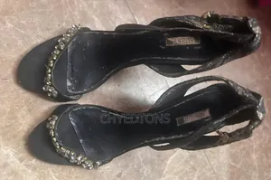 GUESS Black Gold Lace Stiletto Heels