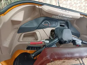 Bajaj RE 2024 Yellow
