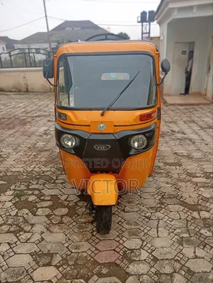 Bajaj RE 2024 Yellow