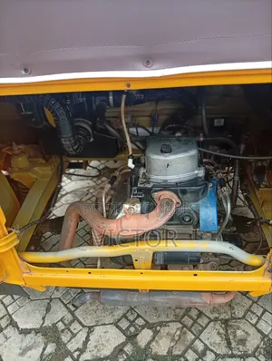 Bajaj RE 2024 Yellow