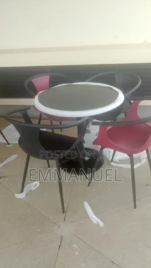 A Set of Outdoor Garden Table and Chairs