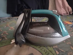 Belgium Steam Iron That Can Never Burn Fabric