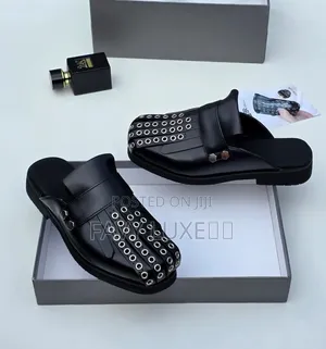 Metallic Eyelet Slip-on Shoes