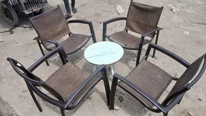 Brown Outdoor Chair Without the Center Table