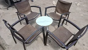 Brown Outdoor Chair Without the Center Table