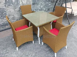 4-Seater Brown Synthetic Rattan Outdoor Dining Set.