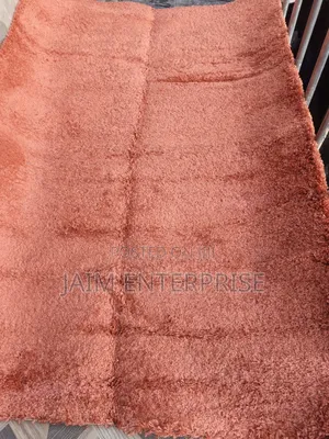 Orange 5 by 7 Center Rug
