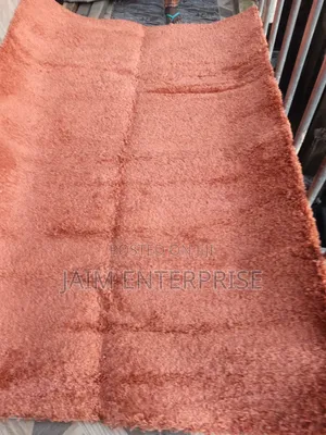 Orange 5 by 7 Center Rug