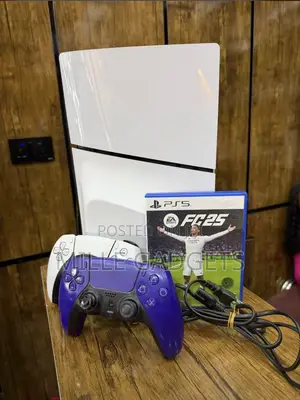 PS5 With Two Controllers and FC25