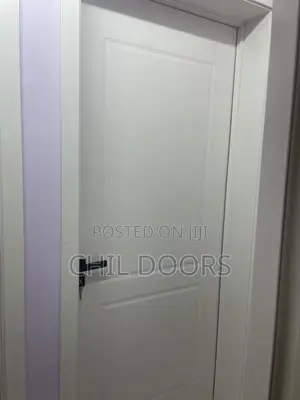 White Wooden Door With Black Handle