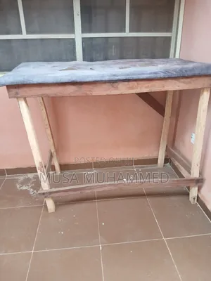 Table That Can Be Used by a Tailore or Dry Cleaner