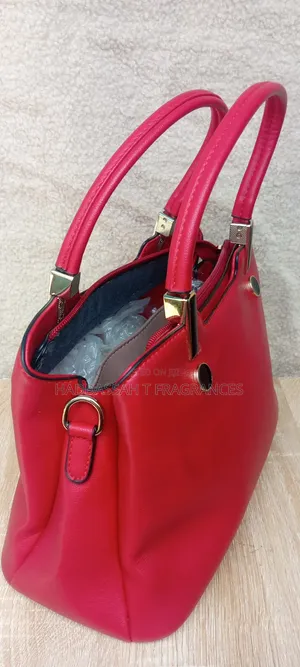 First Grade Red Handbag