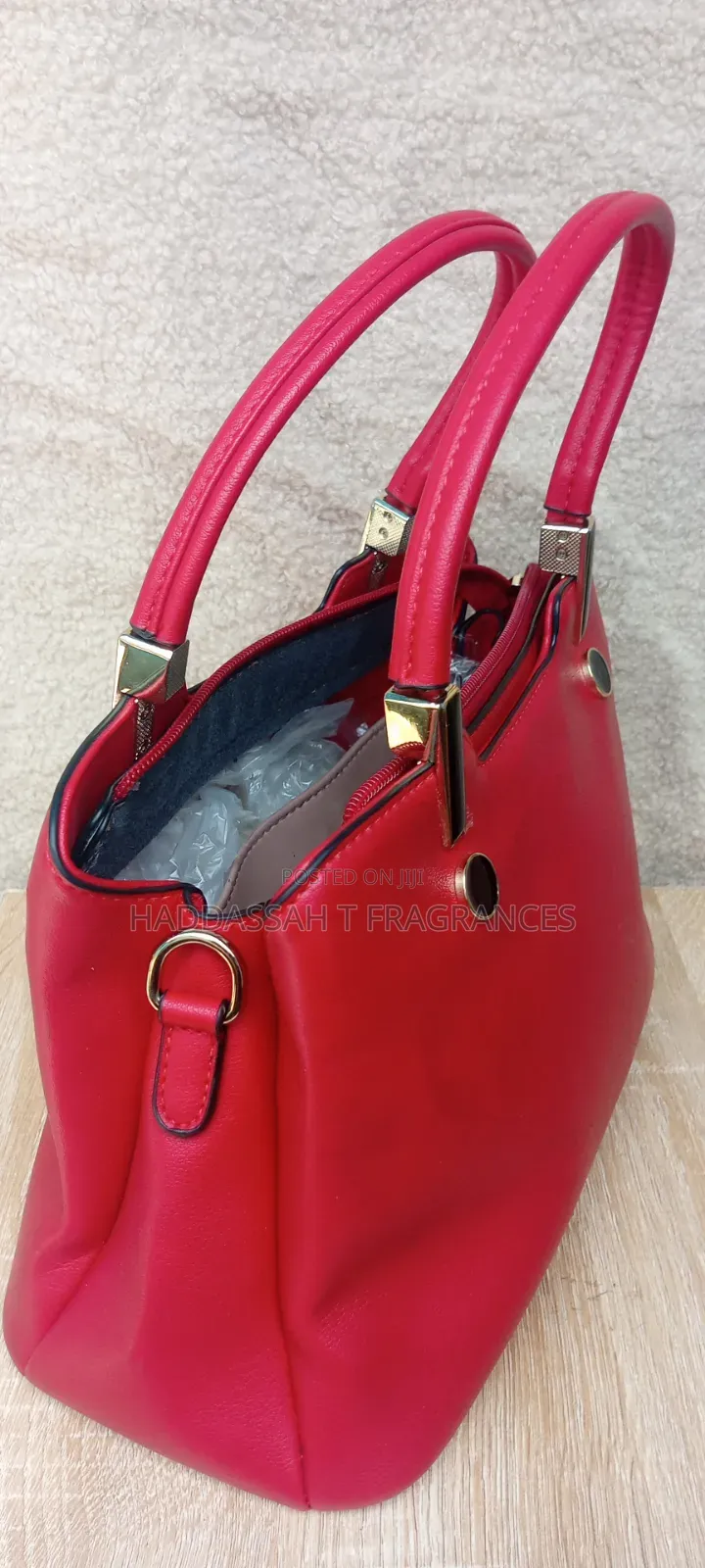 First Grade Red Handbag