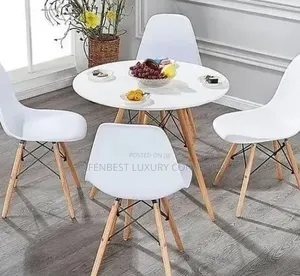 Unique Round Wooden Top Table Restaurant With Four Sets of Chairs
