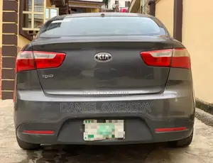Kia Rio EX 4dr Sedan (1.6L 4cyl 6A) 2014 Brown