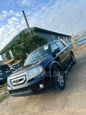 Honda Pilot Touring w/RES/Navi 4WD (3.5L 6cyl 5A) 2011 Black