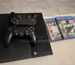 Sony Ps4 With 2 Pads, Gta5, Call of Duty and Fifa 21