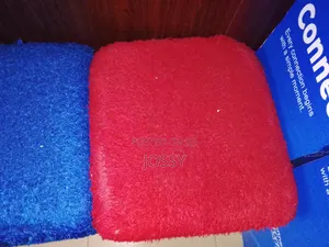 Set of Colourful Upholstered Stools / Poufs