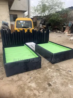 Double Padded 4 Feet by 6 Bedframe With a Side Drawer.