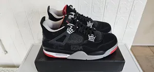 Air Jordan 4 Retro Bred Black Cement 2012.