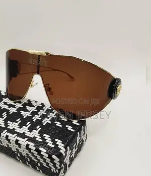 Versace Gold-Tone Shield Sunglasses.