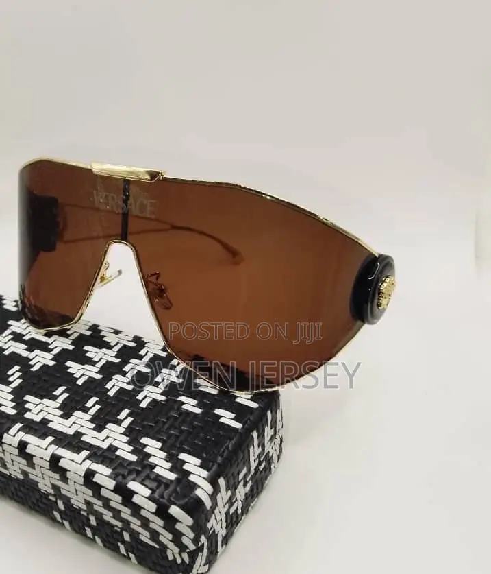 Versace Gold-Tone Shield Sunglasses.