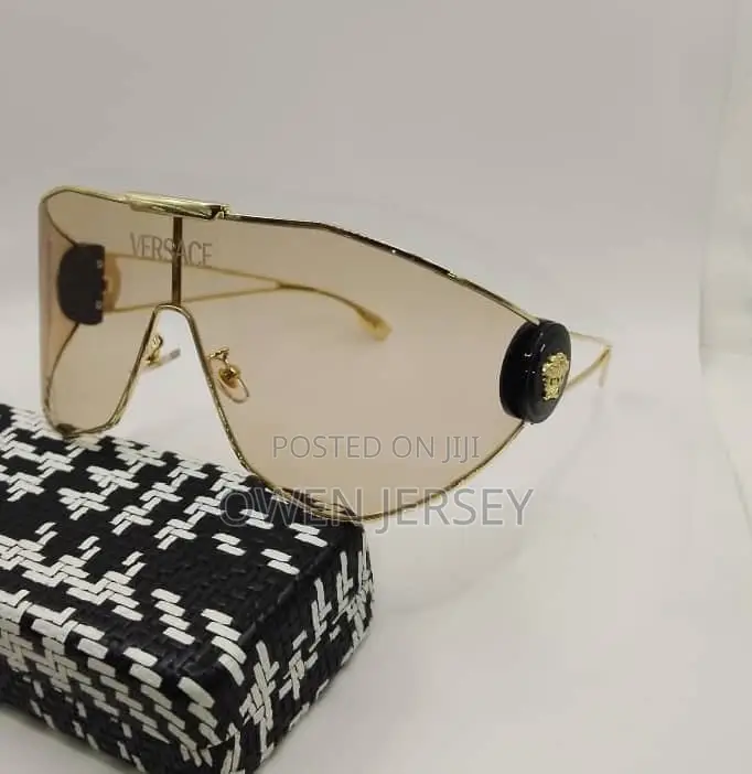 Versace Gold-Tone Shield Sunglasses.