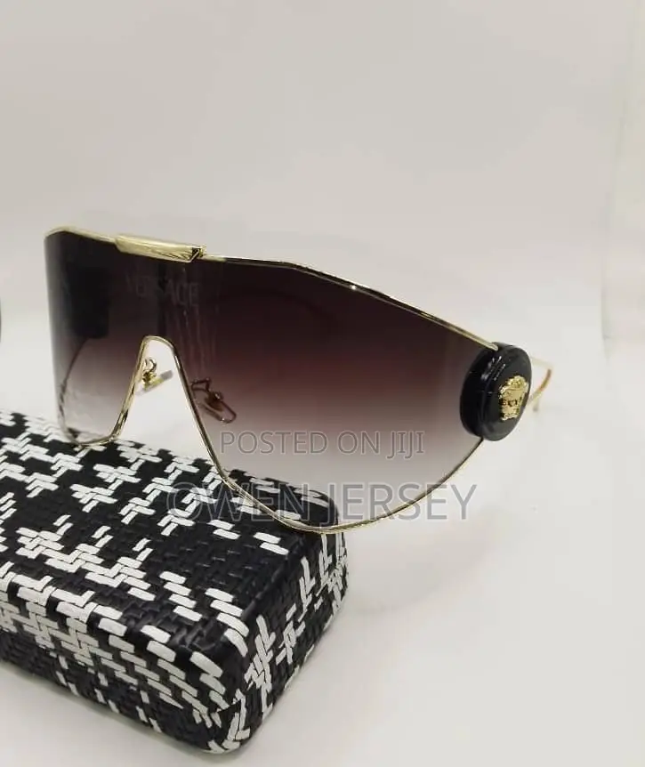 Versace Gold-Tone Shield Sunglasses.