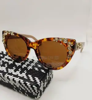 Tortoiseshell Cat-Eye Eyeglasses With Floral Details.