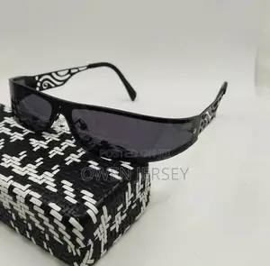 Black Wraparound Sunglasses With Patterned Temples.