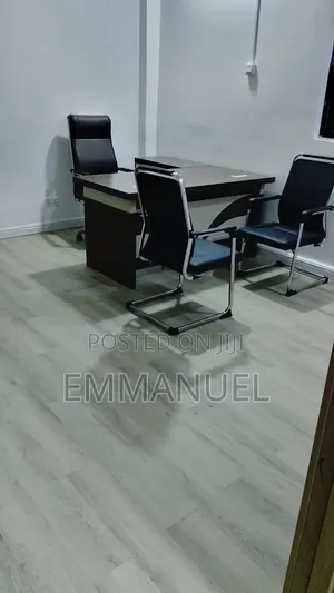 A Set of Executive Table and Chairs
