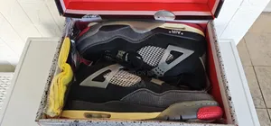 Air Jordan 4 Retro Bred Off White.
