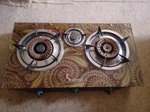 I'm Selling My Neatly Used ( Three Burner) Table Top Glass Cooker