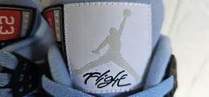 Air Jordan 4 Retro University Blue.