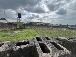 A Plot and Half (Fully Fenced) on a Tarred Road in Alagbaka Gra