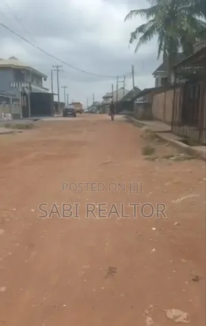 Half Plot on a Corner-Piece of Land With Shops at Aminkanle Alagbado