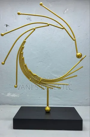 Elegant Golden Vortex Tabletop Statue With Black Base