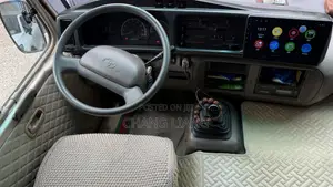 Toyota Coaster 2013 Orange