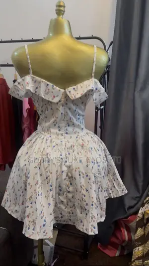 Floral Off-Shoulder Ruffle Mini Dress.