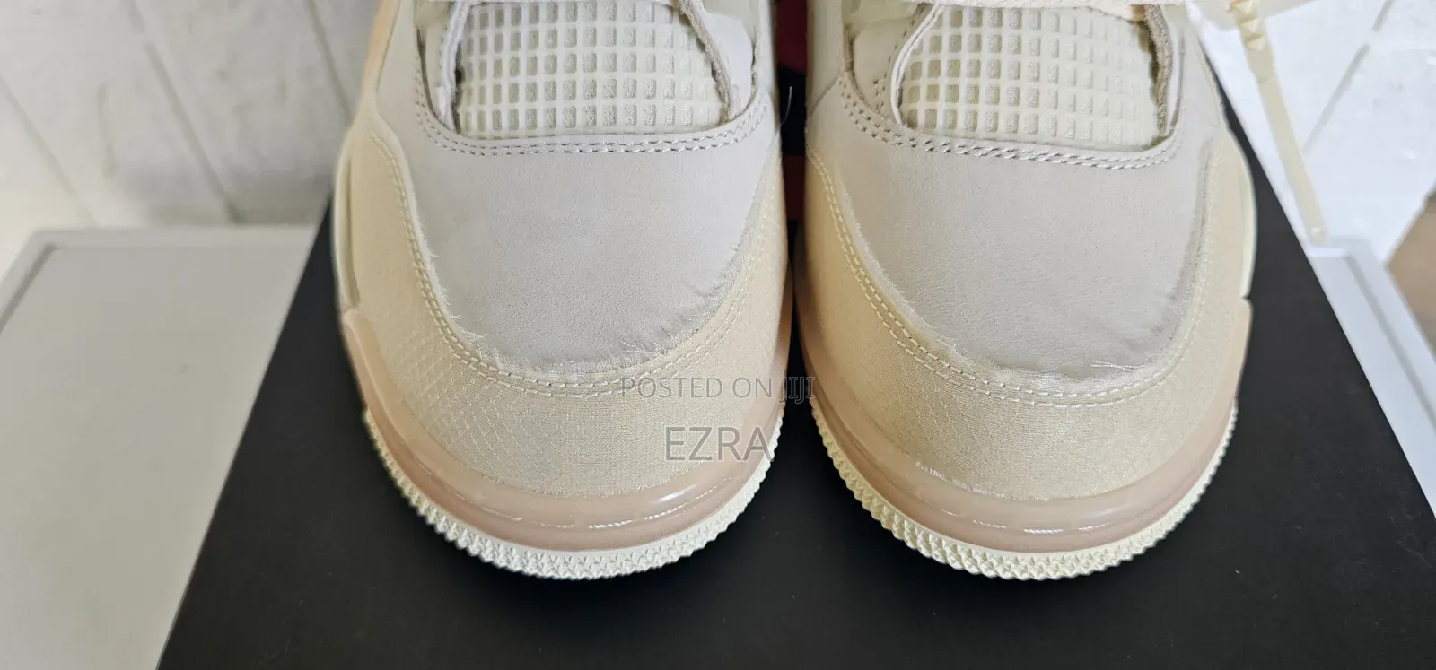 Air Jordan 4 Retro Off-White Sail.