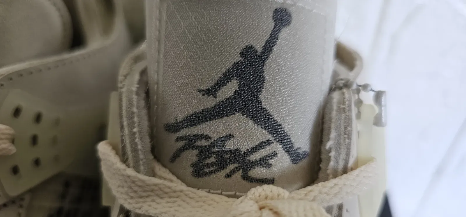 Air Jordan 4 Retro Off-White Sail.