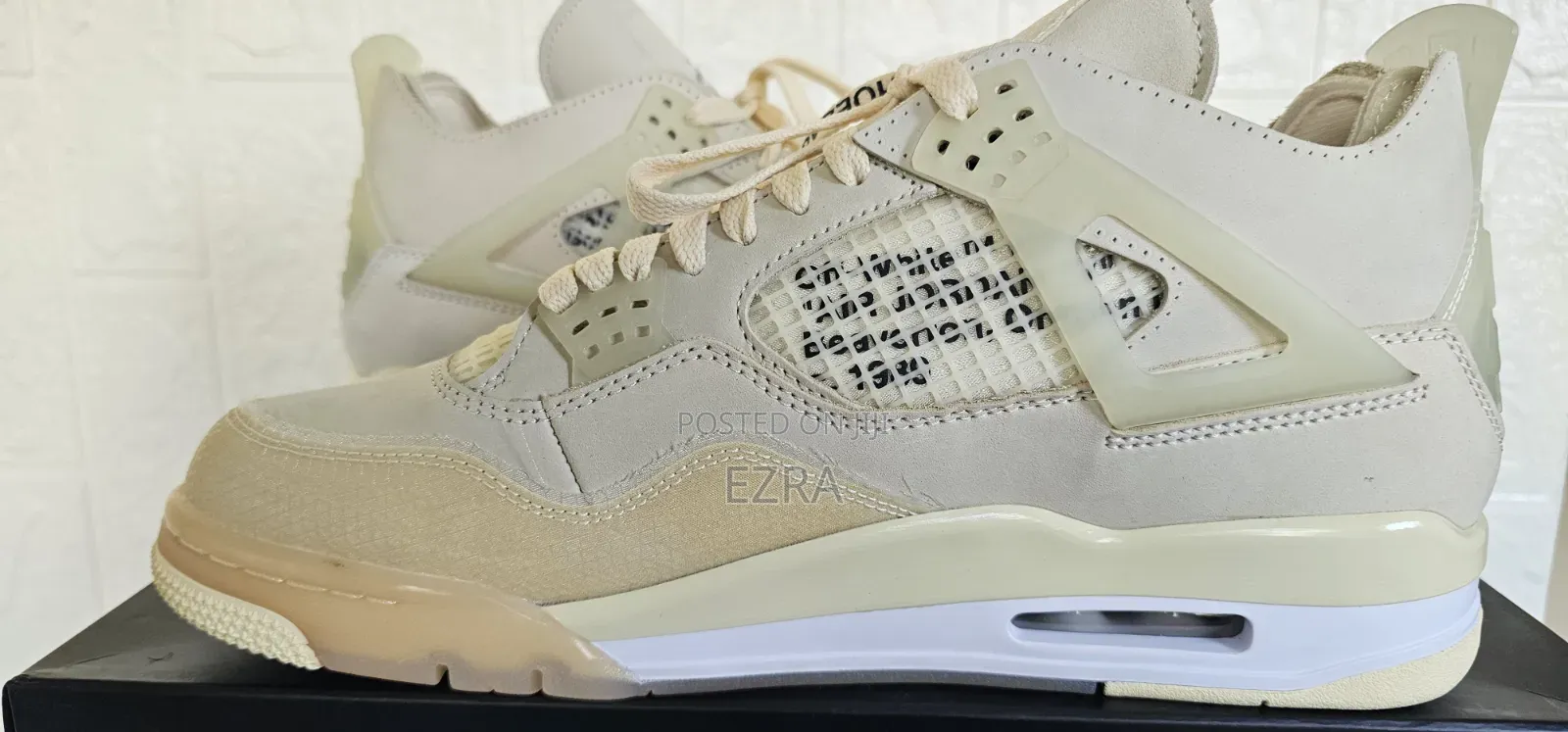 Air Jordan 4 Retro Off-White Sail.