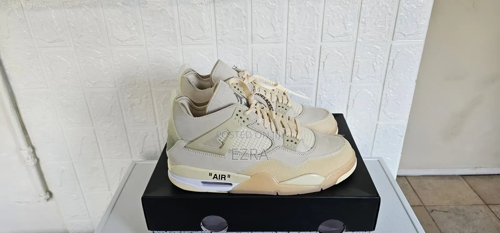 Air Jordan 4 Retro Off-White Sail.